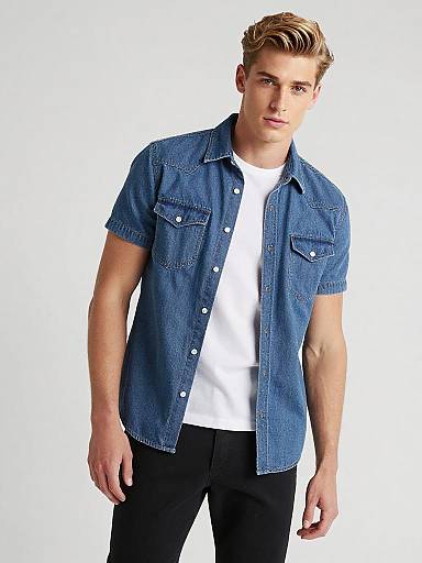 Young man in denim shirt and white tee