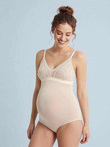 Minimalist High-Key Maternity Lingerie Portrait