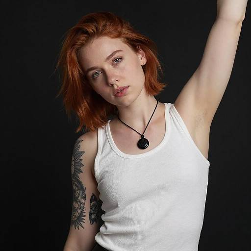 Portrait of Red-Haired Woman with Tattoo
