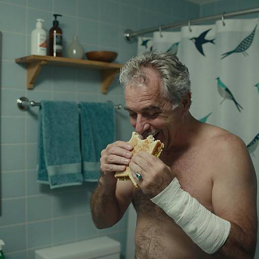 Middle-Aged Man Enjoying Lunch in Bathroom