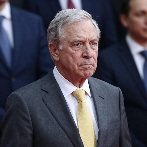 Dramatic Portrait: Older Man in Gray Suit