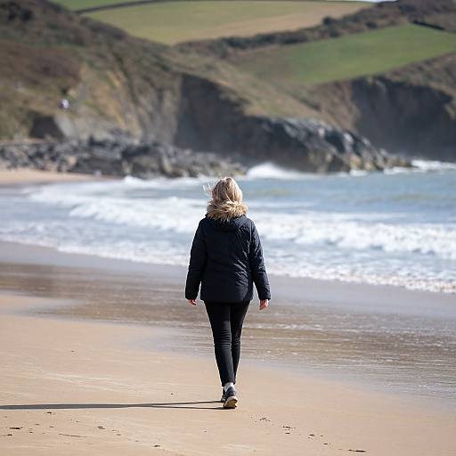 Woman Walking on Southerndown Beach