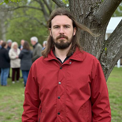 Confident Man in Red Jacket Outdoors