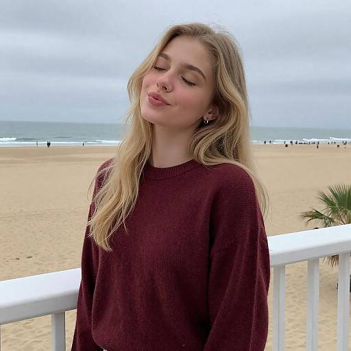 Contemplative Woman on Beachside Balcony