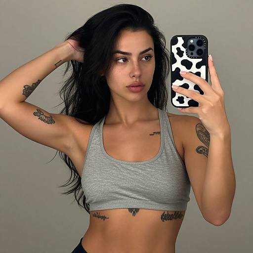 Tattooed Woman Mirror Selfie