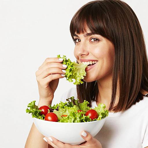 Smiling Woman Enjoying Fresh Salad