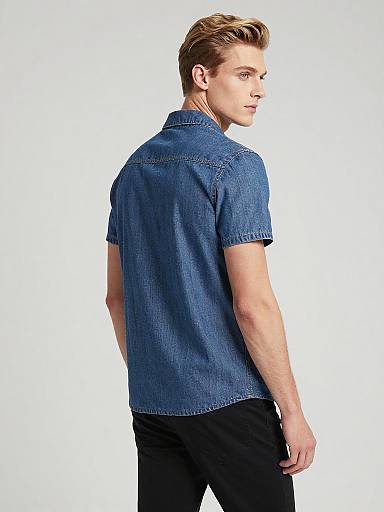 Young Man in Fitted Denim Shirt