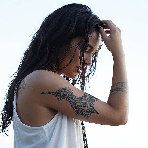 Woman with Wet Hair and Lace Tattoos