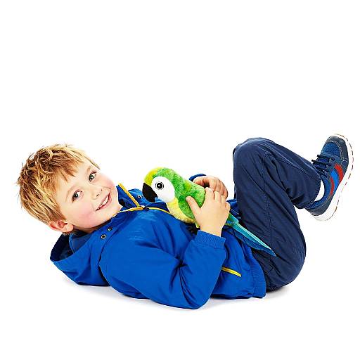 Smiling Child with Plush Parrot