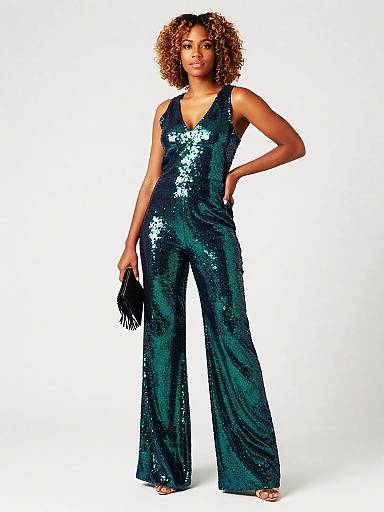 Woman in Green-Blue Sequin Jumpsuit