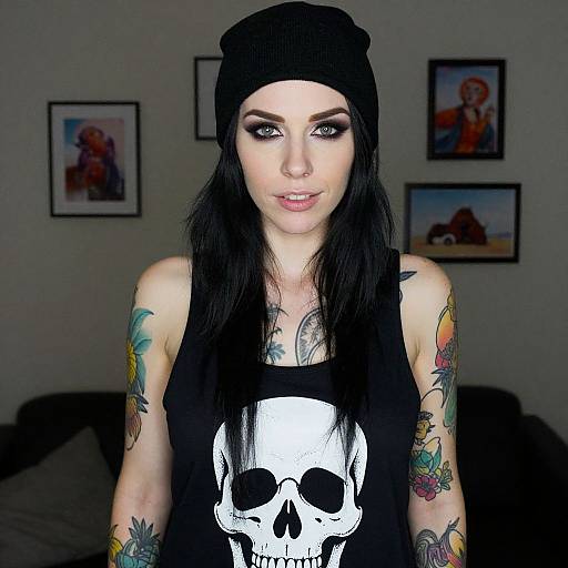 Tattooed Woman in Dimly Lit Room