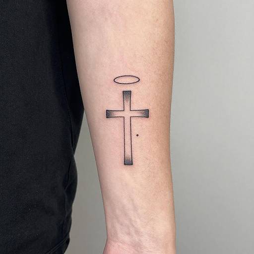Minimalist Saint Symbol Wrist Tattoo