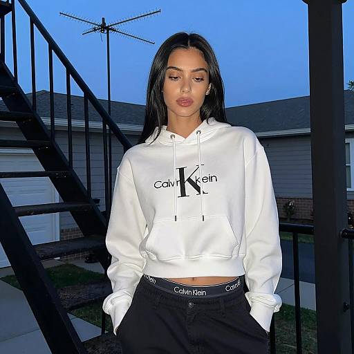 Woman in Calvin Klein Hoodie on Porch