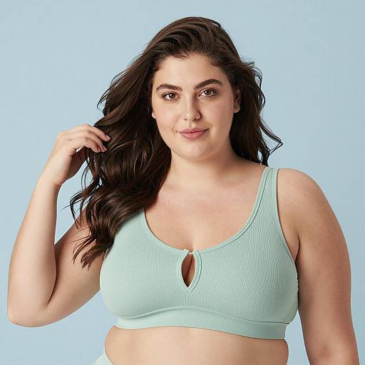 Plus-sized woman in light green ribbed bra