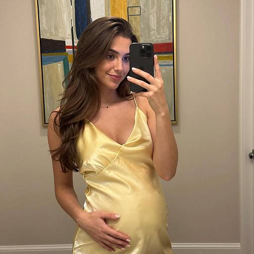 Young Woman in Yellow Dress Taking Selfie