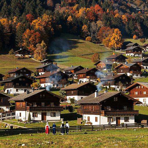Photograph of a picturesque alpine village with wooden chalets, white-walled houses, people in colorful clothes, autumn foliage, and smoke rising from