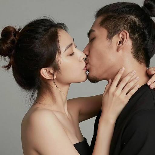 Young Asian Couple Kissing Passionately