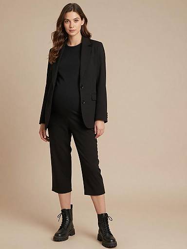 Sleek Monochrome Maternity Fashion Portrait