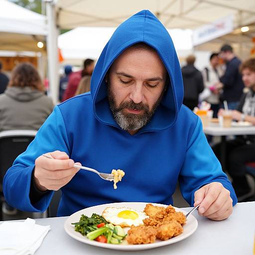 Bearded Man in Blue Supper Costume Eating