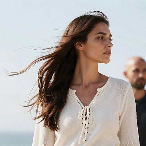 Woman in White Top with Windblown Hair