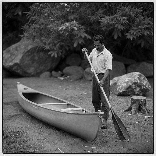 Mysterious Man by a Canoe