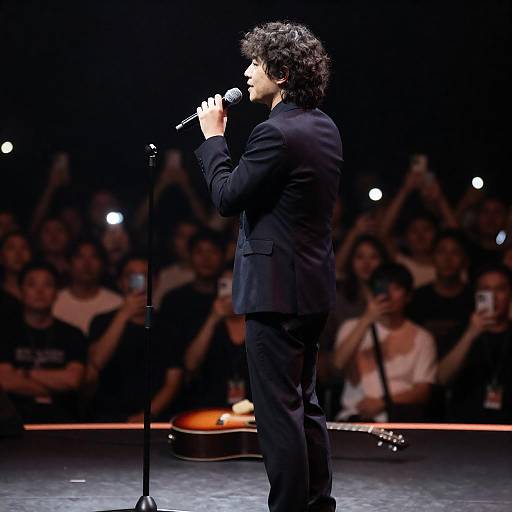 Male Singer on Stage with Spotlight