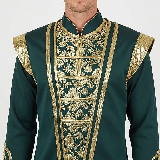 Photograph of a man wearing an ornate black and gold embroidered long-sleeve robe with intricate floral patterns and gold shoulder epaulettes.