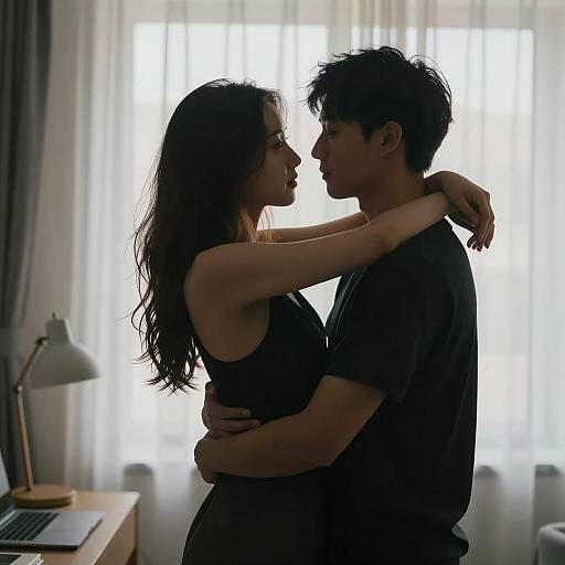 Silhouetted Couple in Intimate Embrace