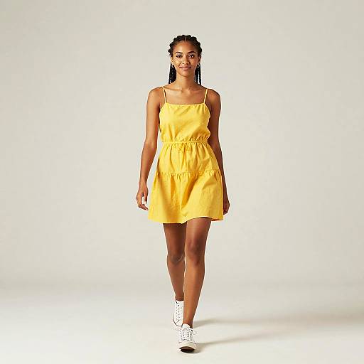 Young Woman in Yellow Sundress Walking