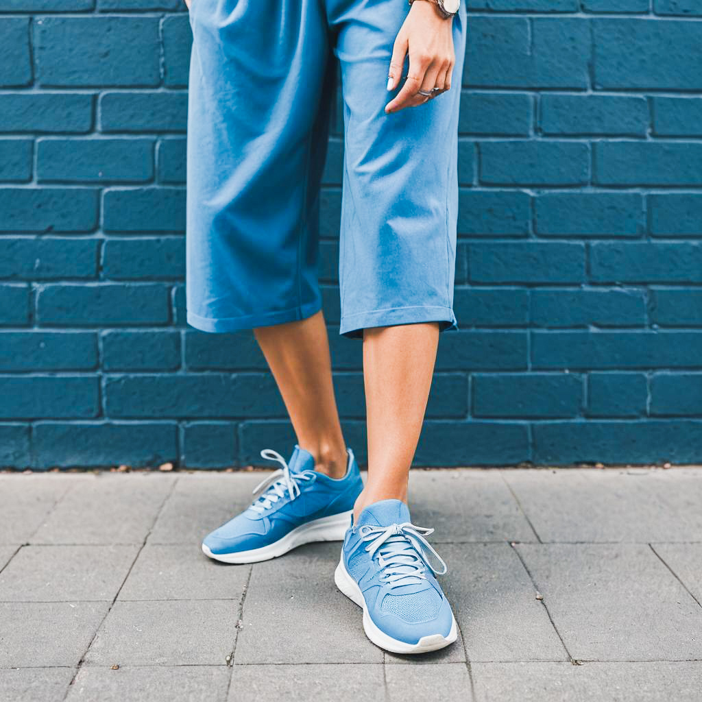 Energetic Woman in Blue Sneakers