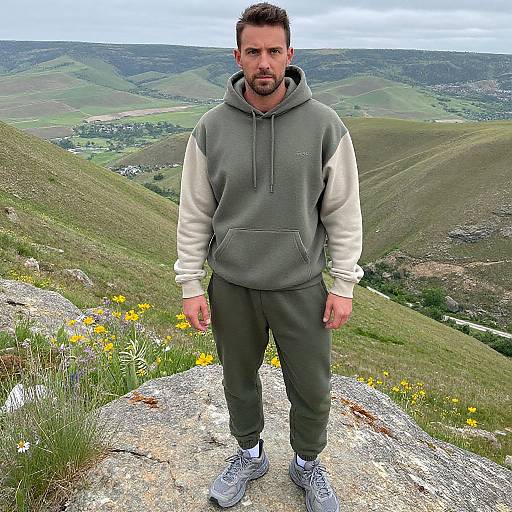 Man in Casual Hoodie at Rocky Viewpoint