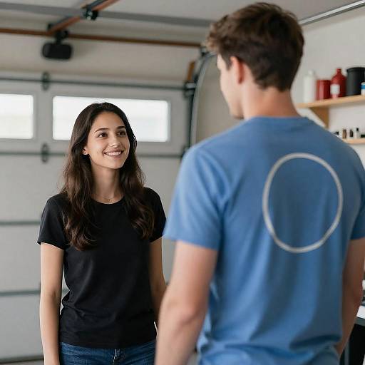 Smiling Couple in Garage, Man Turned Away