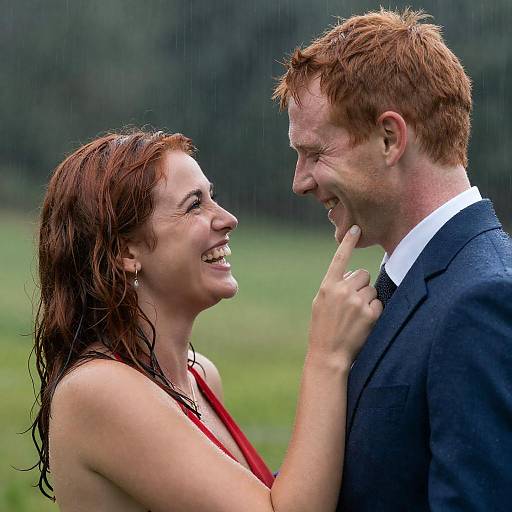 Joyful Couple Embracing the Rainstorm