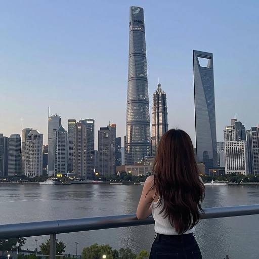 Woman Gazing at Futuristic City Skyline