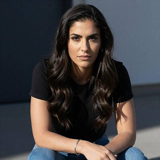 Sunlit Woman in Casual Jeans Pose