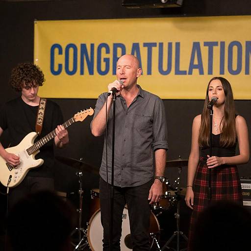 Live Band Performing Under Congratulations Banner