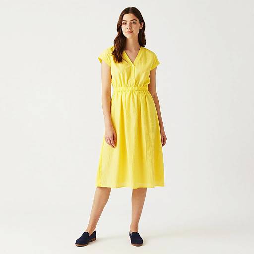 Confident Woman in Yellow Dress