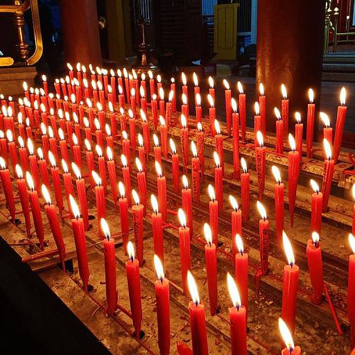 Vibrant Red Prayer Candles Glow