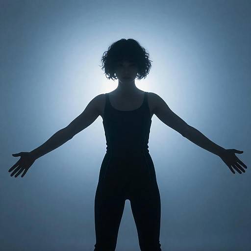 Ethereal Silhouette in Misty Blue Light