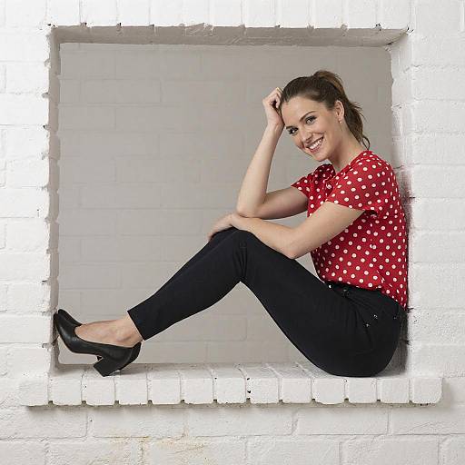 Smiling Woman on White Brick Ledge