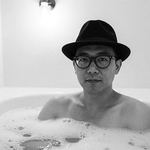 Calm Man in Bubble Bath Portrait