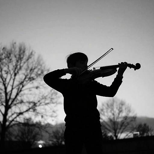 Silhouette of Child Playing Violin
