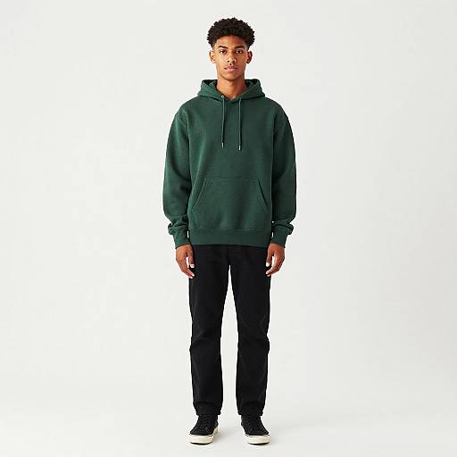 Young Man in Green Hoodie Standing
