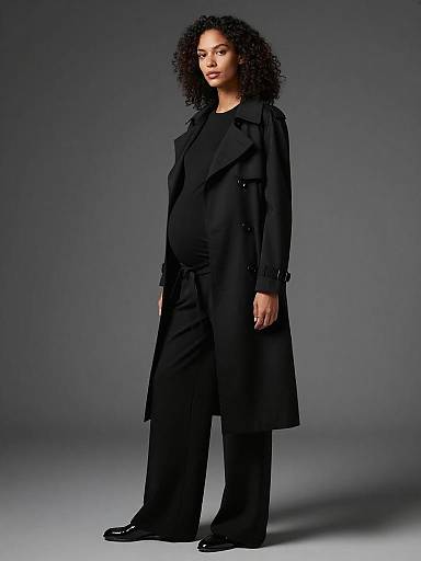 Sleek Monochrome Maternity Fashion Portrait