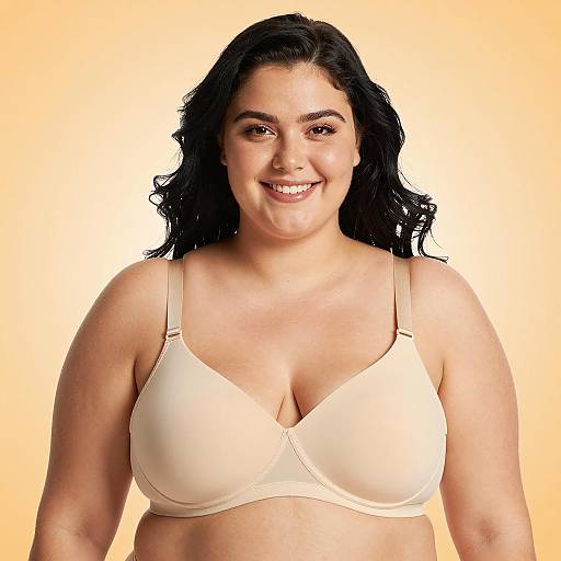 Plus-Size Woman in Beige Bra Smiling