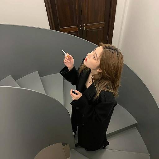 Woman on Spiral Staircase with Cigarette