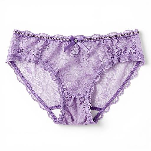 Photograph of a pair of delicate, lavender lace panties with floral embroidery and a small bow in the center.