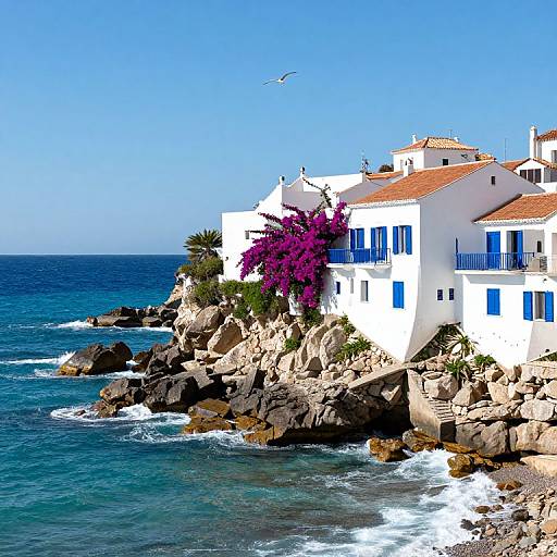 Photograph of a vibrant coastal scene with white Mediterranean-style houses with blue shutters and red roofs, surrounded by rocky cliffs, bright purple bougainville