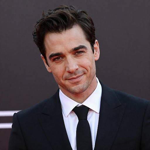 Portrait of Man in Black Suit with Intense Gaze