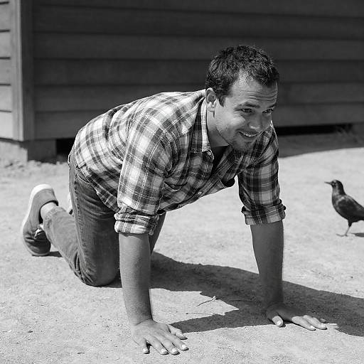 Black-and-White Man Crawling in Sunlight